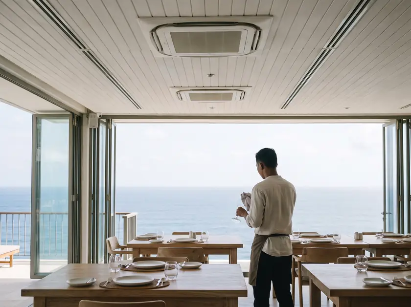 Restaurant dining room in Uluwatu with linear supply diffusers and ceiling cassette air conditioners
